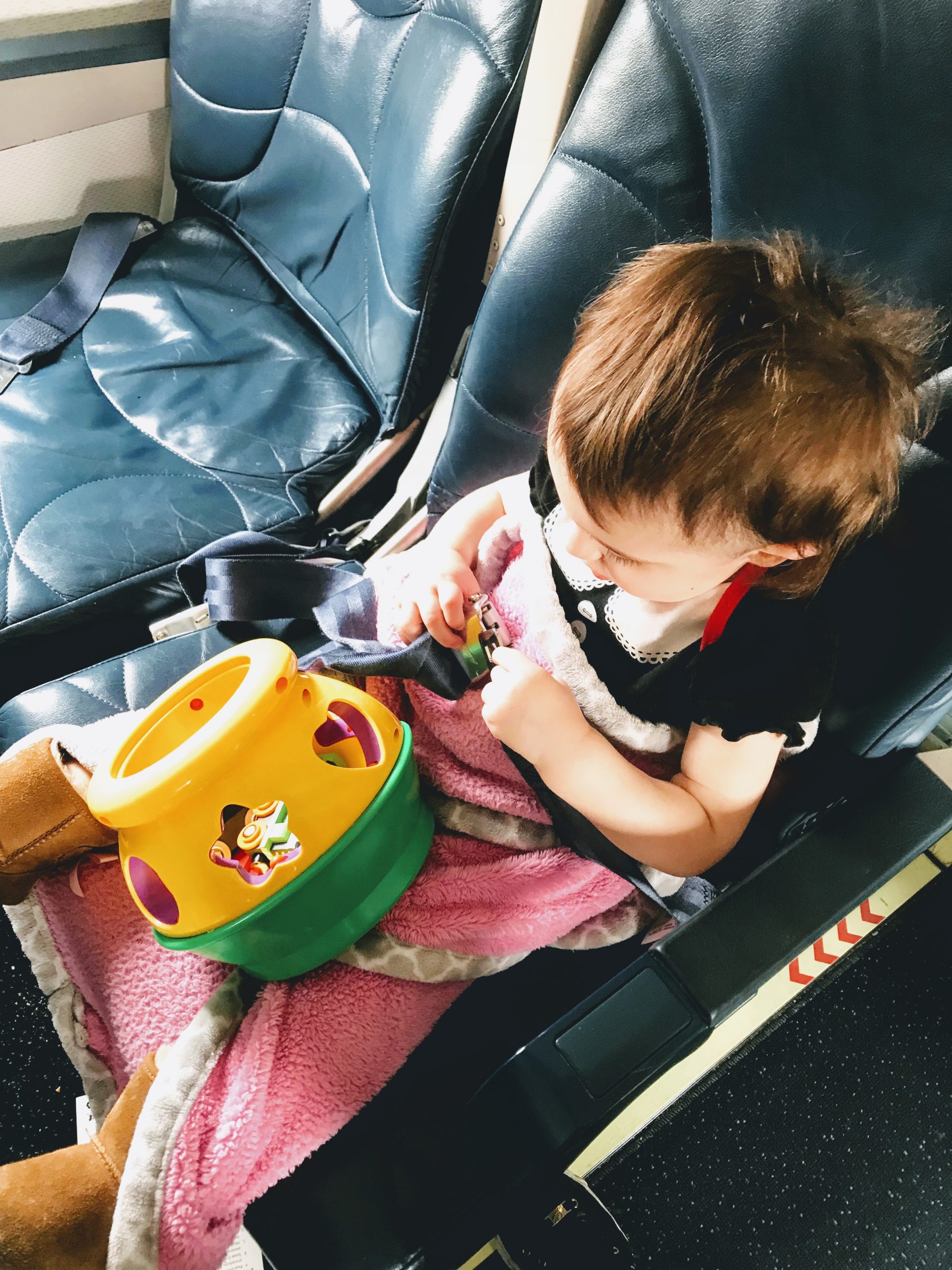 toddler on plane